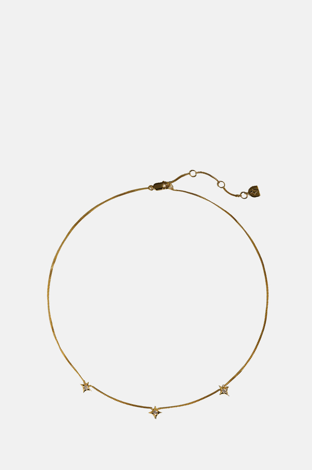 Astrid & Miyu Cosmic Star Charm Necklace in Gold.