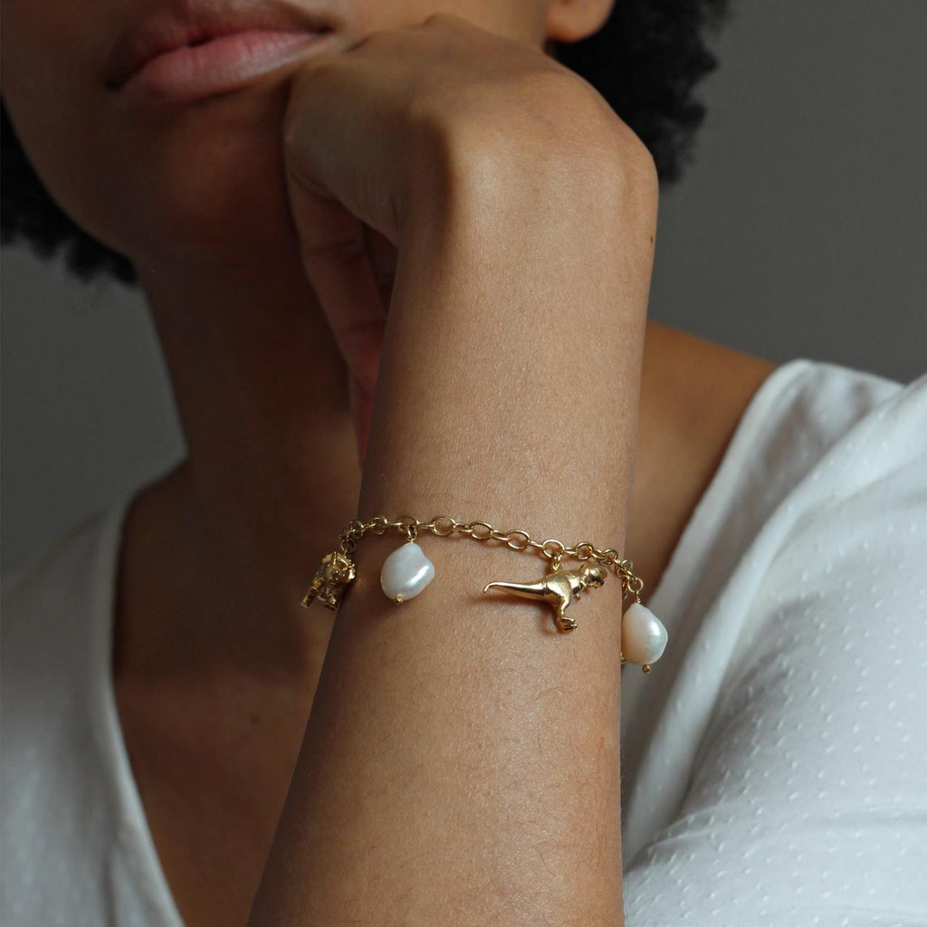 A.M. Dinosaur and Baroque Pearl Charm Bracelet Gold
