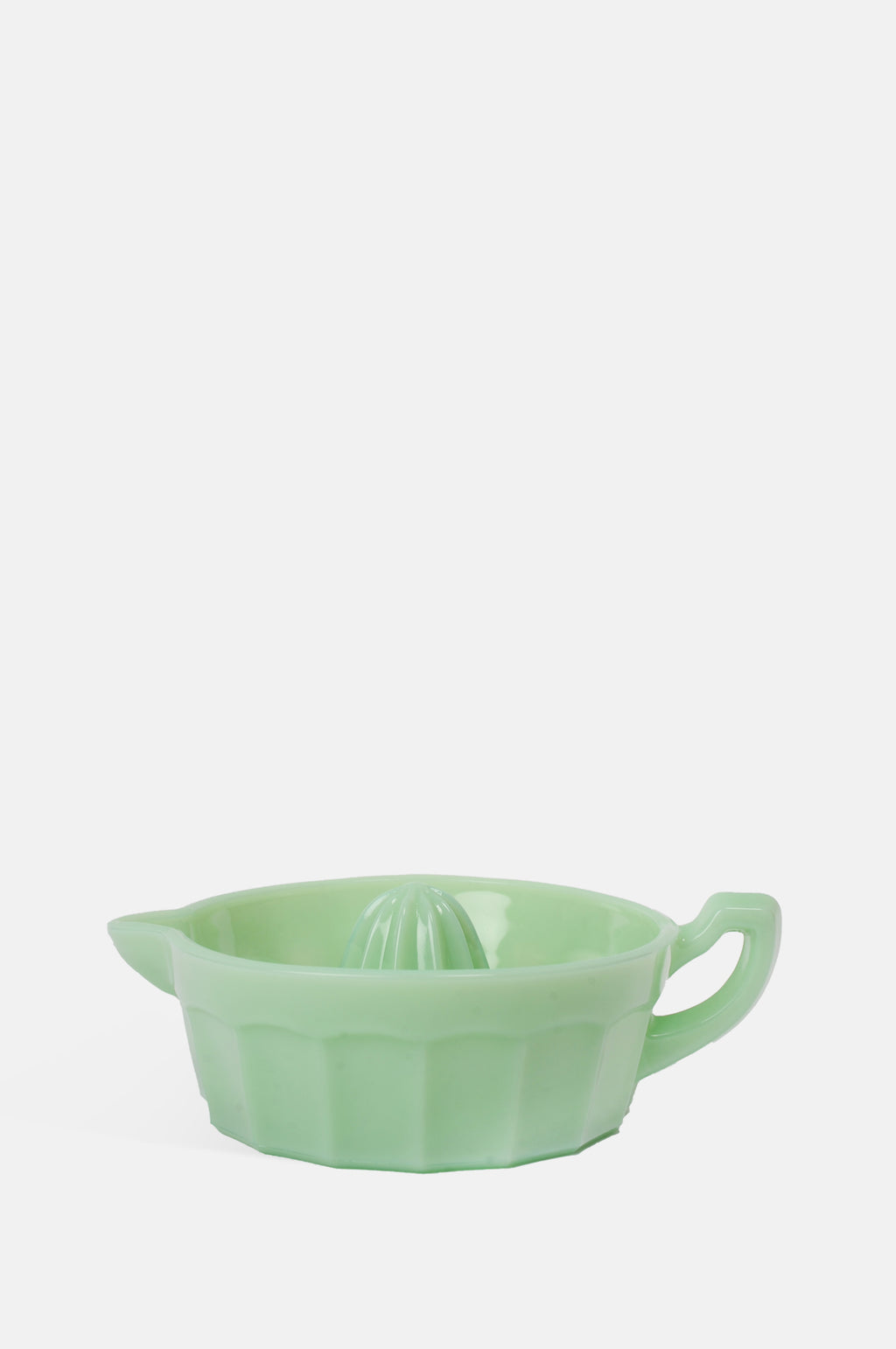Mosser Glass bright jade green juice reamer with pouring handle and panelling.