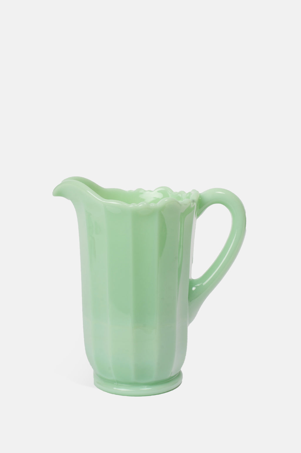 Mosser Glass moulded bright jade green panelled pitcher with irregular scalloped rim.