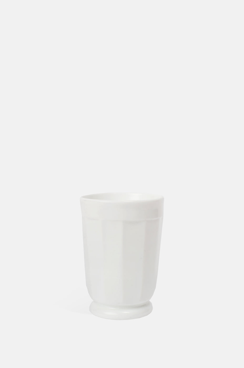Mosser Glass milk white footed panelled tumbler holds 180ml.