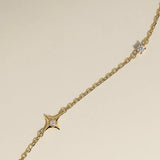 Cosmic Star Charm Bracelet in Gold
