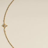 Cosmic Star Charm Bracelet in Gold