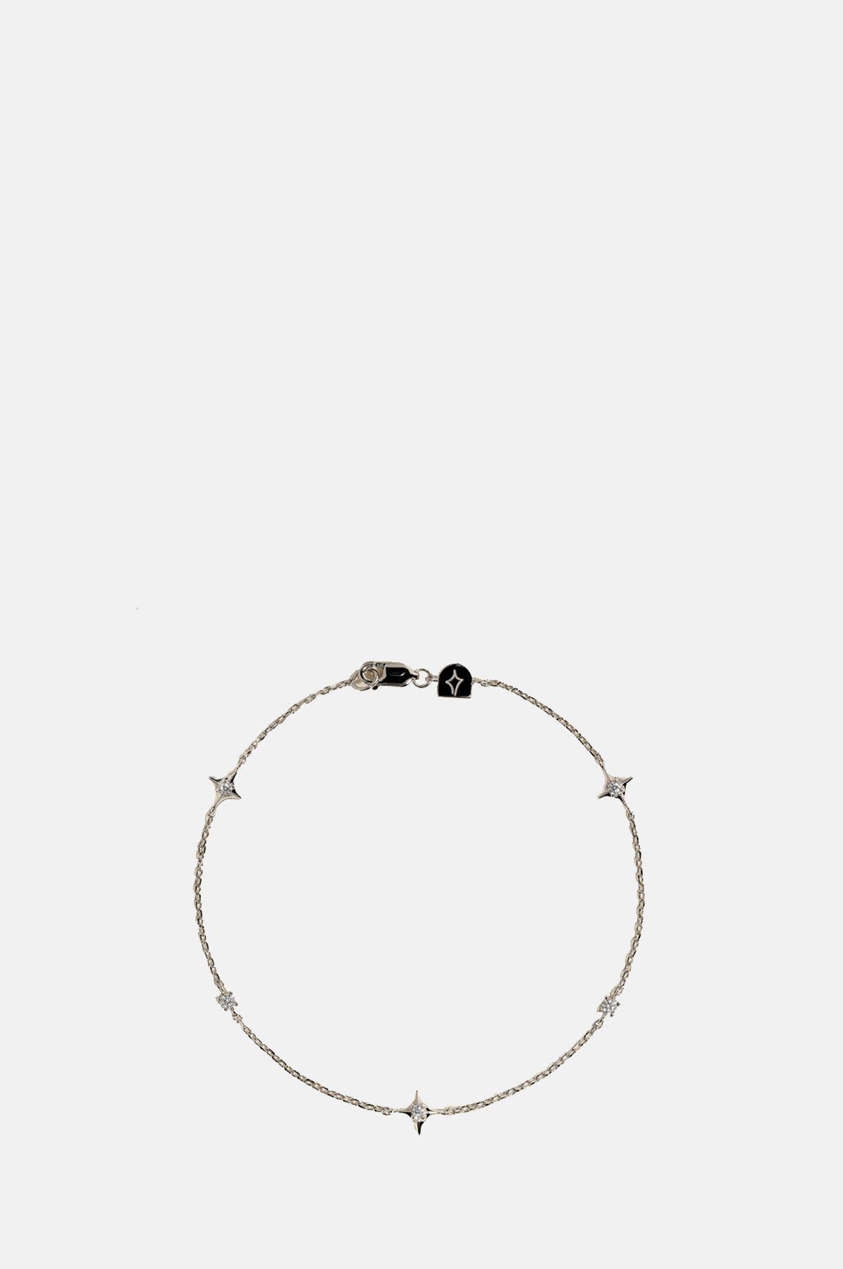 Astrid & Miyu Cosmic Star Charm Bracelet in Silver.
