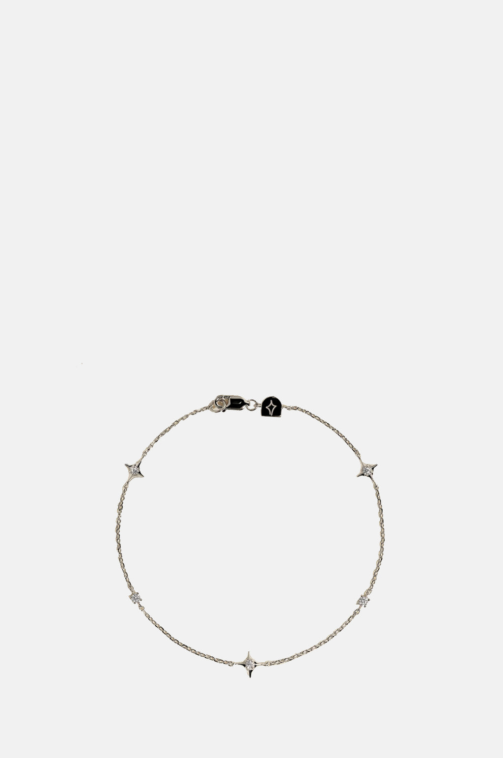 Astrid & Miyu Cosmic Star Charm Bracelet in Silver.