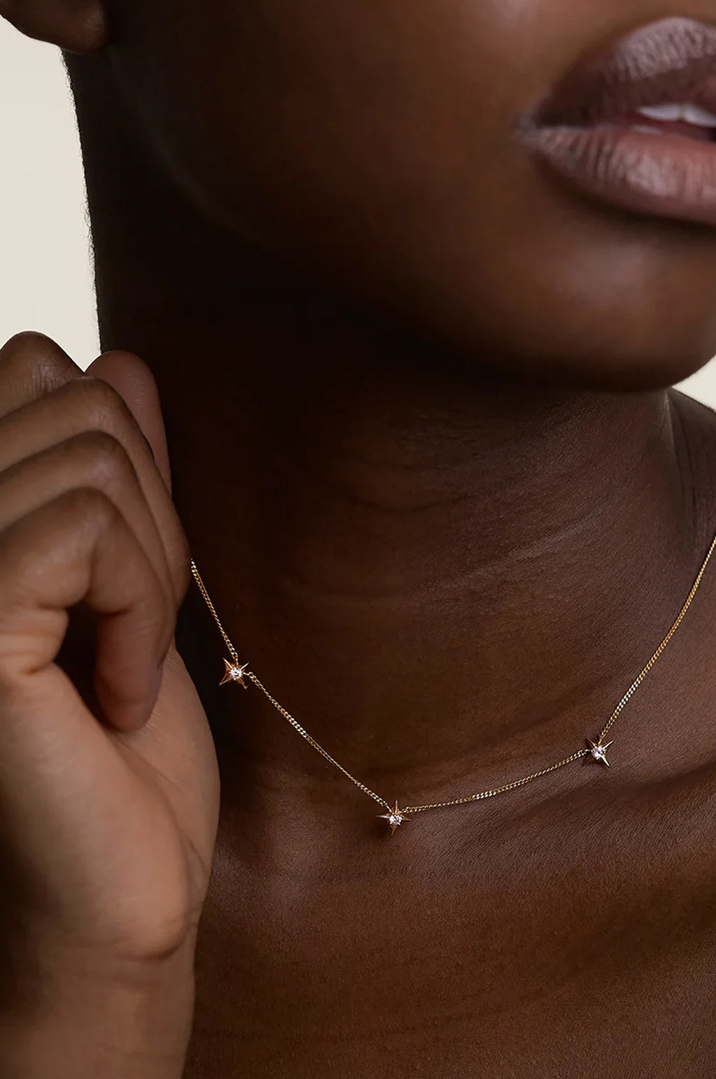 Cosmic Star Charm Necklace in Gold