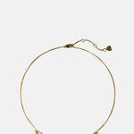 Astrid & Miyu Cosmic Star Charm Necklace in Gold.