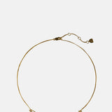 Astrid & Miyu Cosmic Star Charm Necklace in Gold.