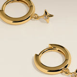Cosmic Star Charm Huggies in Gold