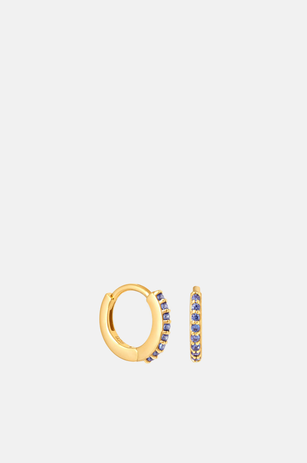 Astrid & Miyu Tanzanite Birthstone Huggies in Gold.