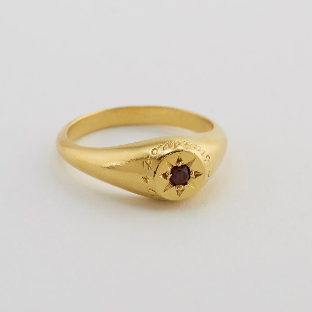 A.M. Garnet Signet Ring with “A Star to Guide Me” Engraving Gold