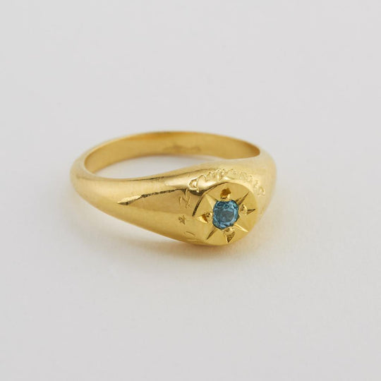 A.M. Blue Topaz Signet Ring with “A Star to Guide Me” Engraving Gold