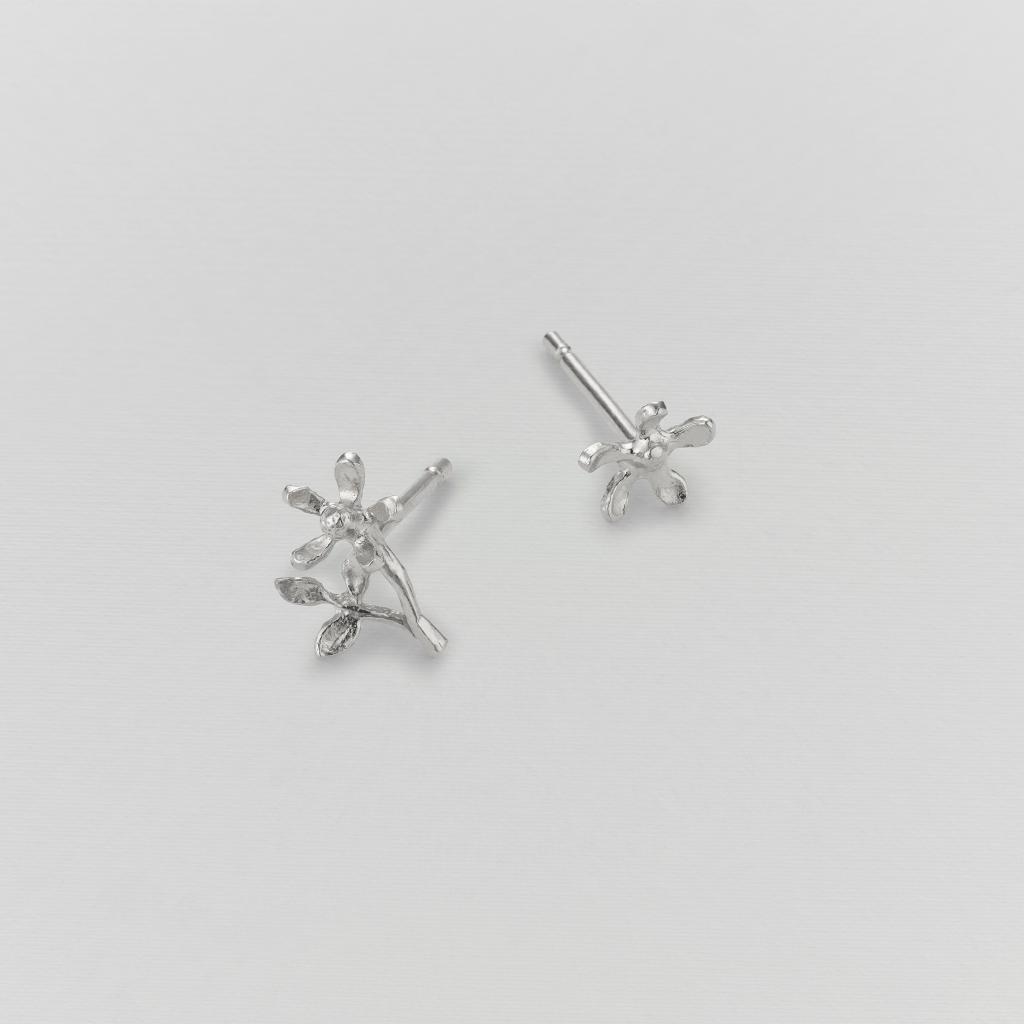 A.M. Asymmetric Growing Flower Stud Earrings Silver