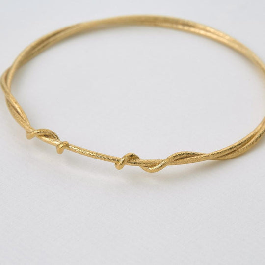 A.M. Classic Twist Bangle Gold
