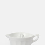 Mosser Glass milk white moulded glass juice reamer with pouring handle.