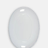 Costa Nova pearl white medium oval platter with pearl edging.