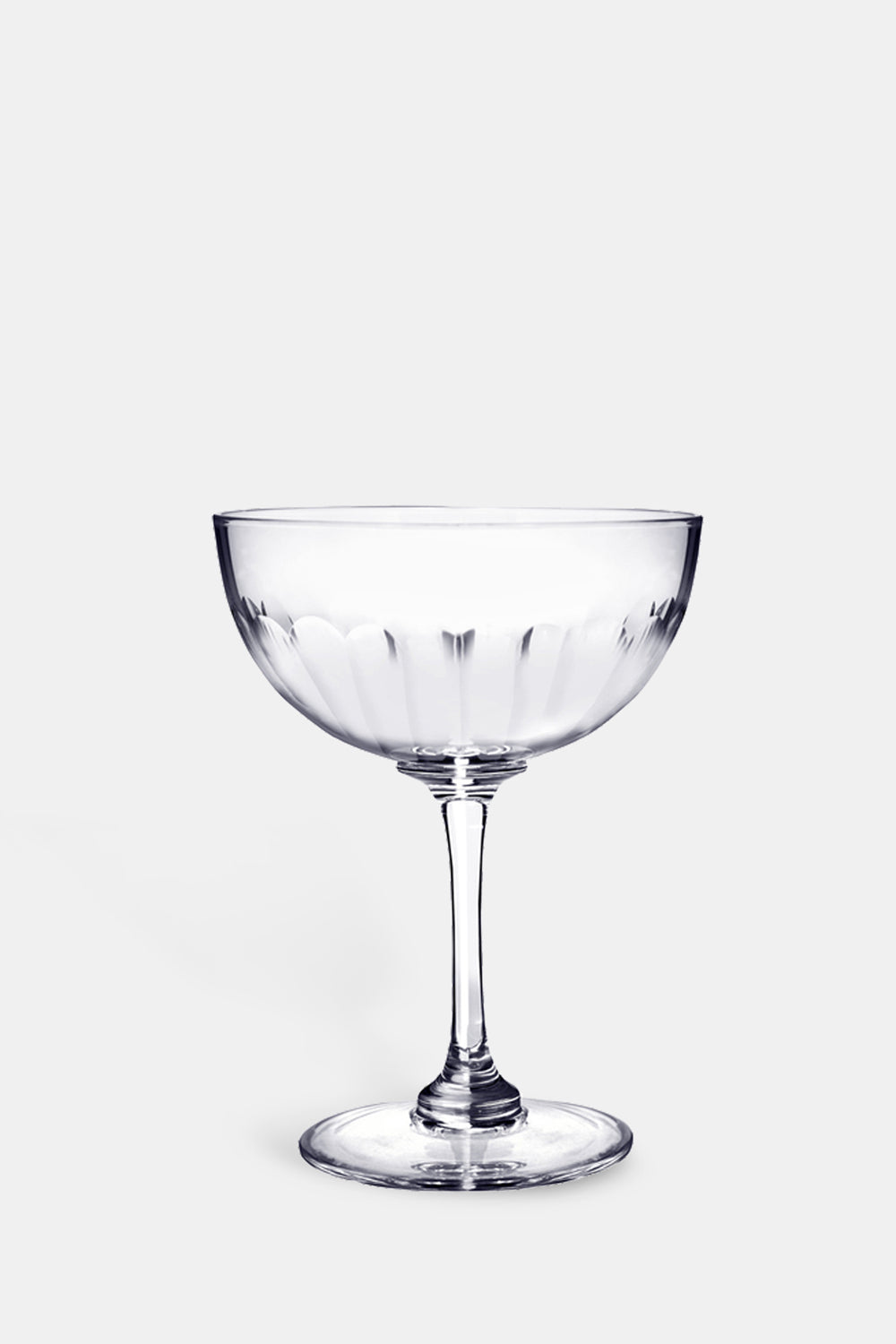 The Vintage List lens champagne saucer with band of connecting oval detailing.